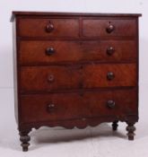 A Victorian mahogany 2 over 3 straight front chest of drawers.