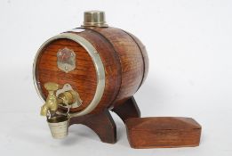 A large decorative coopered oak barrel with EPNS mounts  together with a wooden box