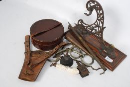 A mixed lot to include a 19th century hanging bracket / piano sconce, a leather knife frog,