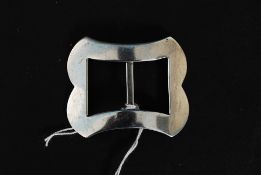 A silver hallmarked buckle by Lawrence Emanuel bearing Birmingham hallmarks for 1919. Weight 7.