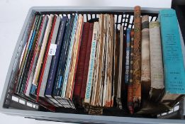 A large collection of antique auction catalogues and books ( see illustration ) to include hardback