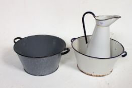 A vintage white enamel dairy / wash jug with matching bowl and another similar enamel bowl.