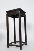 An early 19th century Chinese hardwood torchere / jardiniere.