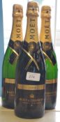 Three bottles of Grand 2000 Vintage Moet Chandon Champagne.