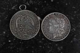 A Mexican reale coin, along with a USA  American coin, both with silver content.