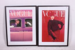 A pair of framed and glazed magazine covers of Vogue magazine
