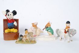 Royal Doulton - THe Ice Ball figure group model no DBH 30 by Shane Ridge together with a Beswick