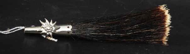 A believed Scottish white metal silver and horsehair military hat mount having pin to rear for use