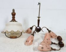 A retro 1970's pull down milk glass and oak lamp together with a set of similar wall lights and 3