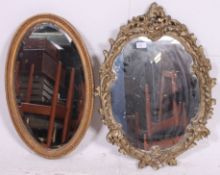 A gilt moulded framed mirror along with a rococo gilt scroll work plaster mirror