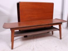 A 1970's retro teak drop leaf dining table together with a 1970's retro Danish style teak