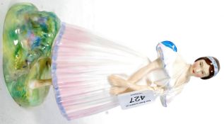 A Royal Doulton HN2138 La Sylphide figurine together with an early Wadeheath figurine of a creeping