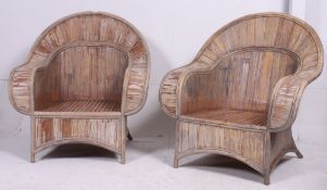 A 1930's style excellent shaped large bamboo plantation style pair of garden armchairs having swept