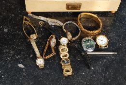 A collection of vintage ladies cocktail watches along with gents and a silver metal propelling