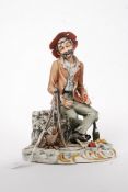 A good Capodimonte Italian ceramic figurine of seated tramp cooking.