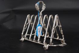 A good silver plated taost rack of rococo adams revival fom