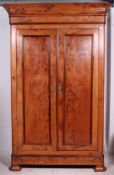A 19th century French walnut armoire dou
