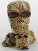 A cold painted bronze candlestick in the