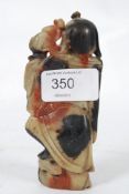 A 20th century chinese soapstone figurin
