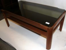 A retro vintage 1970's smoked glass and