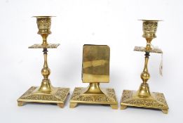 A pair of 19th century brass candlestick