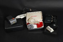 A collection of vintage shaving razors t