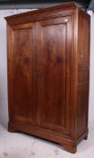 A 19th century French solid armoire doub