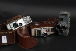 A collection of three vintage cine camer