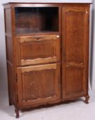 A 20th century large oak French bureau b