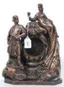 A 20th century large heavy bronze clock