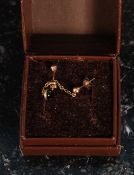 A pair of 9ct gold ball stud earrings