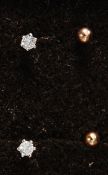 A pair of 9ct diamond claw set stud earr