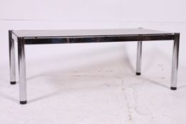 A vintage 1970's chrome and mirror glass retro rectangular coffee / occasional table.