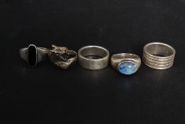 A collection of 5 contemporary silver 925 rings to include Chinese dragon, stone set,