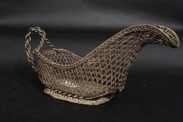 A 20th century retro wirework vintage wine pourer of solid construction with handle atop.