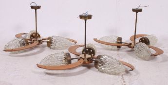 A set of 3 retro 1950's boomerang teak and glass ceiling light chandeliers of beautiful