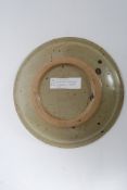 A David Leech studio pottery plate - swirl and line decoration with paper label to rear for Lower