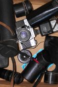 A collection of vintage SLR camera lenses to include Hanimex zoom, variable auto tube,