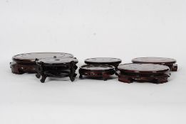 A collection of Chinese hardwood socle bases for vases / figurines etc