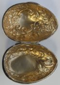 An Edwardian silver hallmarked hinged lidded trinket box in the form of an egg by Nathan & Hayes