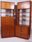 A pair of G-Plan teak wood upright bookcase / cabinets.