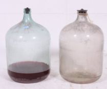2 vintage large glass olive bottles / wine bottle carboys of large bulbous form with thin necks