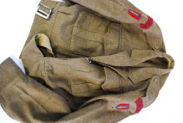A British Army issue RAOC military uniform jacket, 1940 pattern.