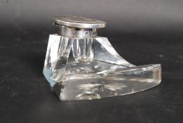 A hallmarked silver and glass Art Deco inkwell, stamped for Birmingham, with Z date letter.