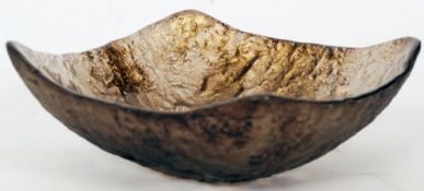An unusual 20th century studio glass dish, in a gilt brown colouring.