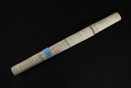 A 19th century Japanese shibiyama carved ivory / bone dagger, carved with typical oriental scenes.