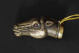 A 20th century brass vesta match case in the shape of a horses head