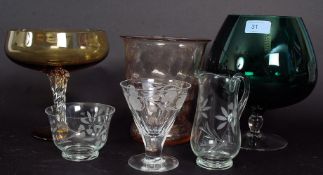 A collection of glassware to include a large studio glass, celery holder,