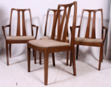 A set of  Nathan dining chairs raised on squared supports with overstuffed seats having angular