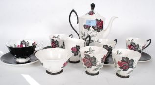 A  good Royal Albert part tea service in a two tone colour with chintz floral spray comprising
